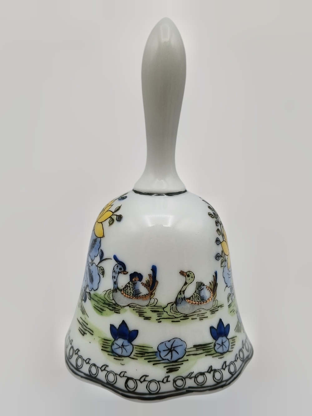 White Porcelain Decorative Bell with Blue and Yellow Duck Motif